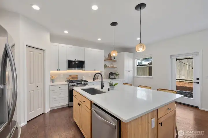 Custom designed kitchen with newer stainless steel appliances