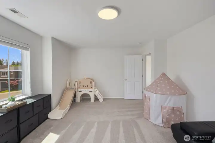 huge bonus room with a closet
