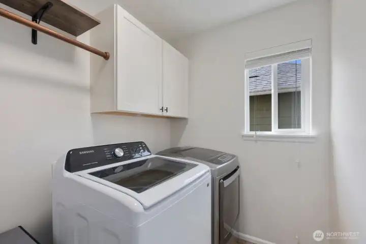 designated laundry room on 2nd floor next to the primary