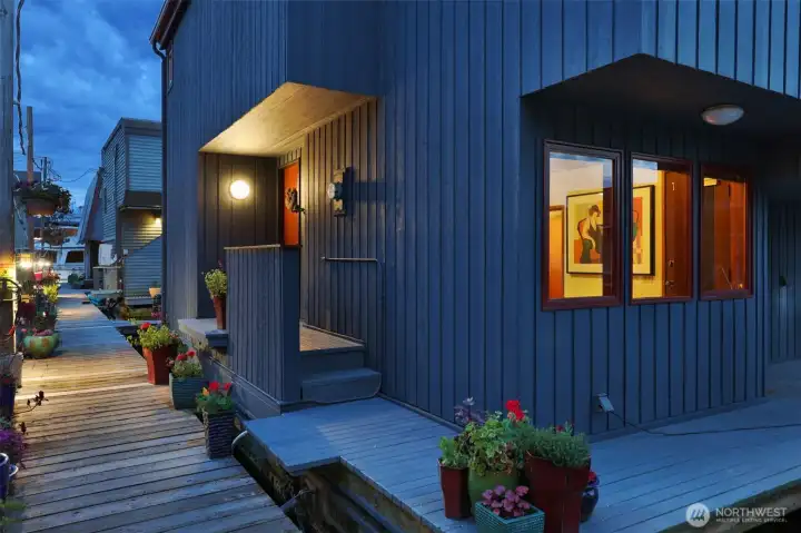 A welcoming boardwalk to arrive home to an intimate community of 21 floating homes.