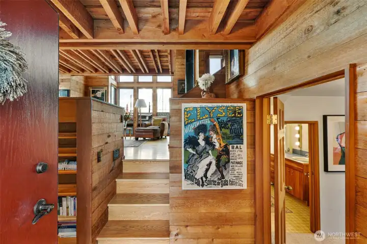 Entry to the home. To the left is the library and to the right is an extra room which leads to a half bathroom.