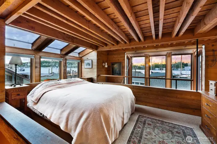 The primary bedroom can be closed off by oversized canvas shades from the rest of the house.