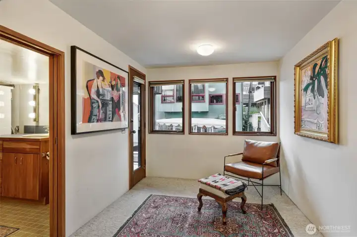 This room would make a nice secondary office, guest space, or storage area.  The door leads out to the covered deck and your boat.