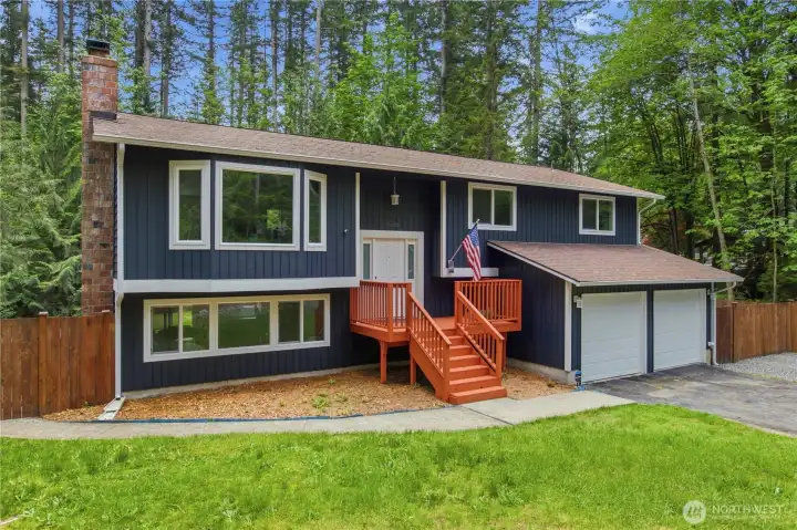 Freshly updated from top to bottom, this home features new windows, doors, garage doors, and beautifully completed permitted renovations.