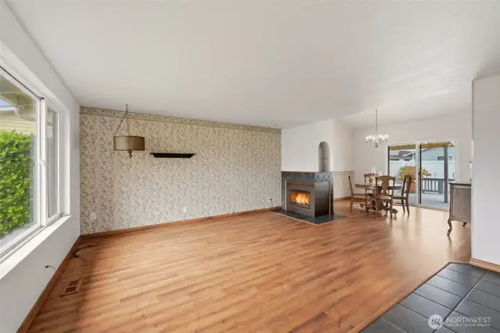 The lovely living room offers a cozy gas fireplace and great natural light!