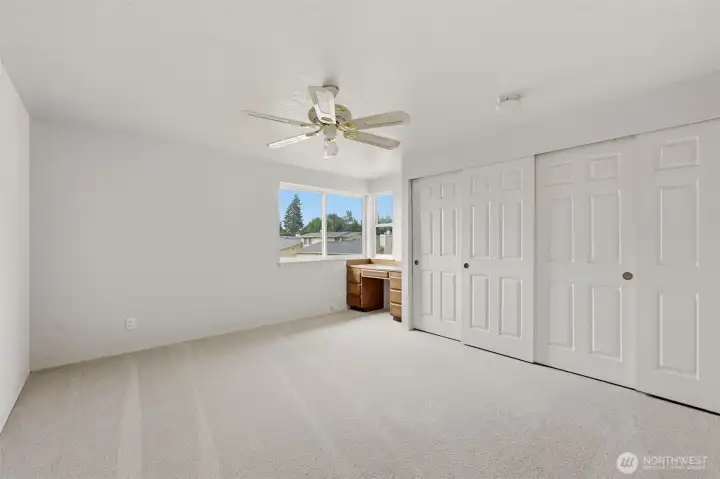 The first upstairs bedroom shown here without staging.