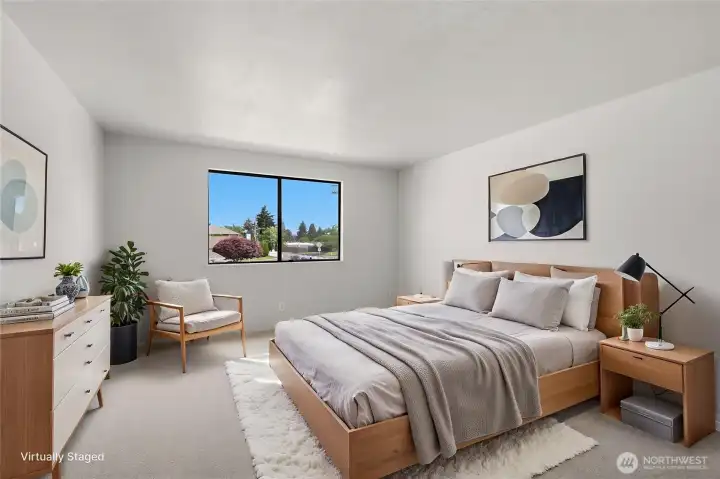 This second upstairs bedroom is a great size to hold a bedroom set! (Shown virtually staged)