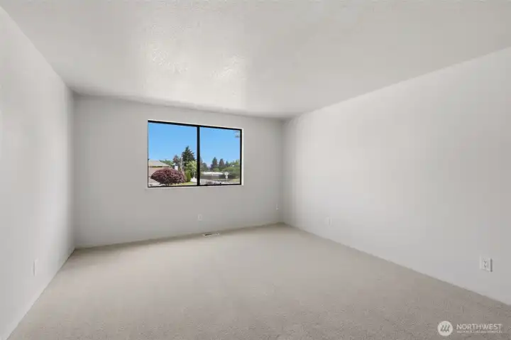 This is the second upstairs bedroom shown without staging.