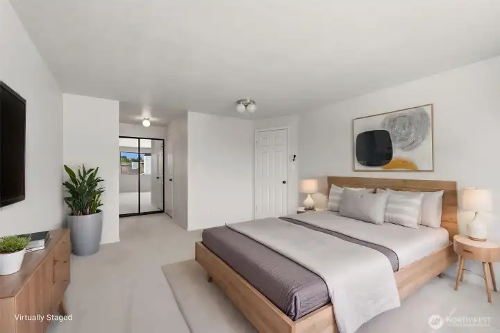 Another view of this bedroom shows the dressing area. (Shown virtually staged)