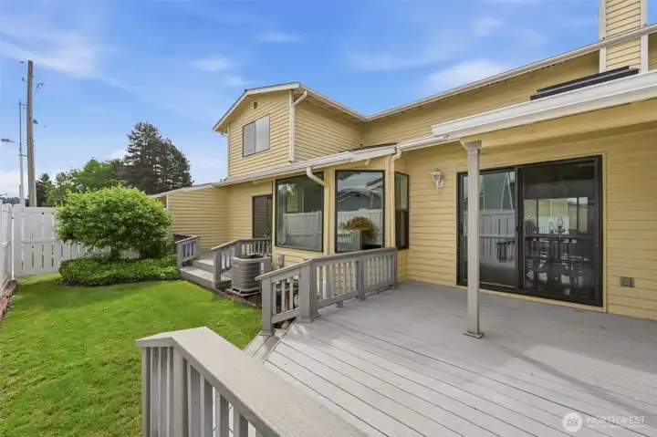 Fabulous extended deck offers plenty of space for patio chairs and plants!