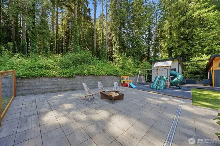 Dedicated playground area within the fenced yard. Dedicated playground area within the fenced yard.