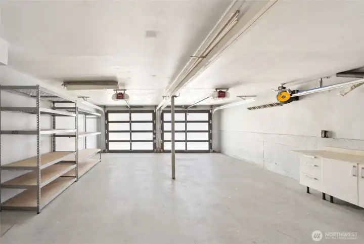 Detached 2-car garage with additional parking area. Detached 2-car garage with additional parking area.