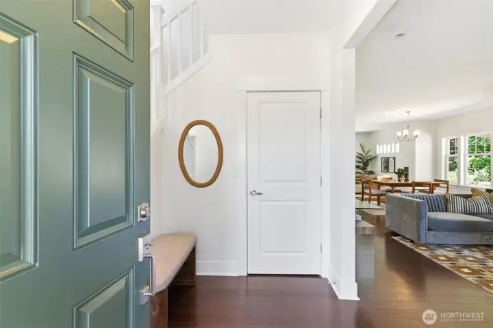 A bright, welcoming foyer greets you with a large storage closet and a built-in spot to sit and take off your shoes, offering a calm pause before entering the heart of the home. A bright, welcoming foyer greets you with a large storage closet and a built-in spot to sit and take off your shoes, offering a calm pause before entering the heart of the home.