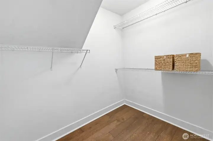 The primary bedroom has two spacious walk-in closets for added convenience. The primary bedroom has two spacious walk-in closets for added convenience.