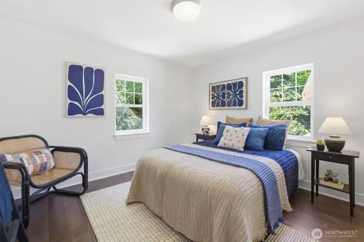 One of four spacious bedrooms upstairs. One of four spacious bedrooms upstairs.