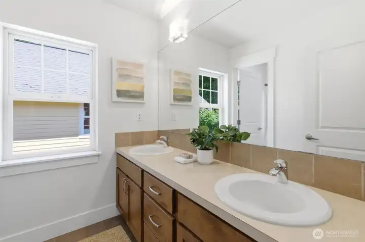 A main hallway full bath serves the 3 bedrooms A main hallway full bath serves the 3 bedrooms