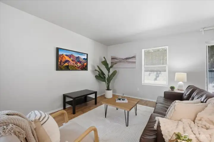 Use this space for the main living room with cable located just behind the black table.
