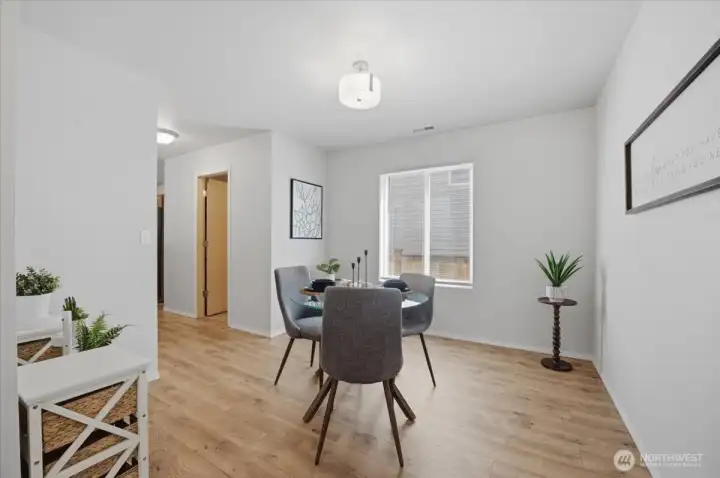 Dining area has plenty of space for a hutch and larger dining room table.