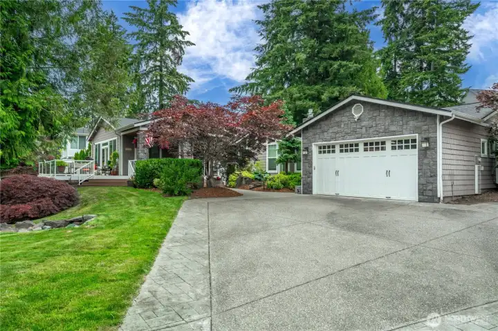 Front approach and two car garage.