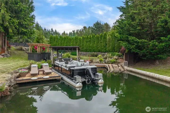 Boat ramp for the watercraft and boat slip (optional purchase of Pontoon Boat). Plus a couple of waterfront sun spots.