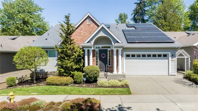 Set on a quiet street on a lovely greenspace lot is this wonderful Cedar plan home in Trilogy.