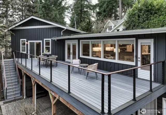 New upper deck with stairs down to the patio and hottub.