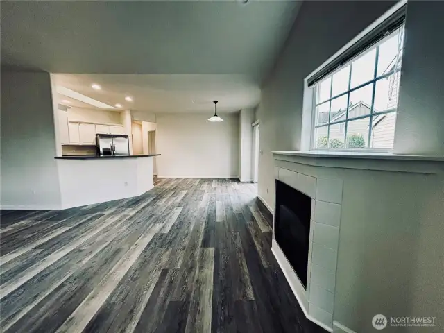 Spacious living room, dining room and gas fireplace