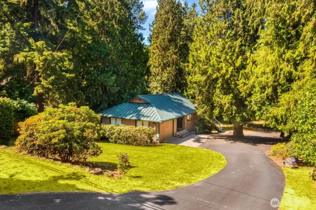 Neatly tucked away yet close to all the amenities, you'll find this well maintained home on an acre+ lot, plenty of additional parking, a huge shop and Northshore Schools