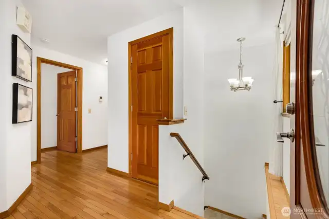 Entry doorway - here you'll find access to the primary bedroom to the left and hallway to the main rooms of the home or head down stairs for your additional 3 bedrooms, family room and easy backyard access