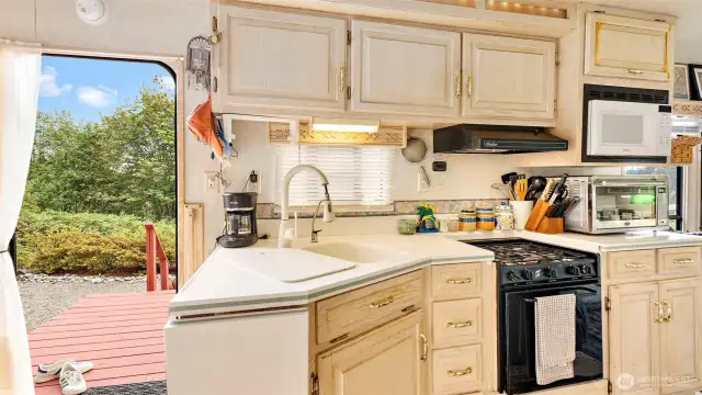 Inside the fifth wheel, it’s simple living at its best, with everything you need in a compact, well-organized space.