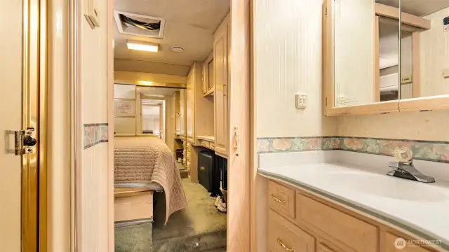 The bathroom connects directly to the bedroom for convenient, private access.