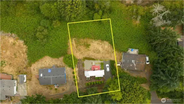 Lot lines are approximate, but this quarter acre delivers a wealth of potential - whether you embrace full-time life in the well-appointed fifth wheel, or design and build a future home to take advantage of this awesome setting.