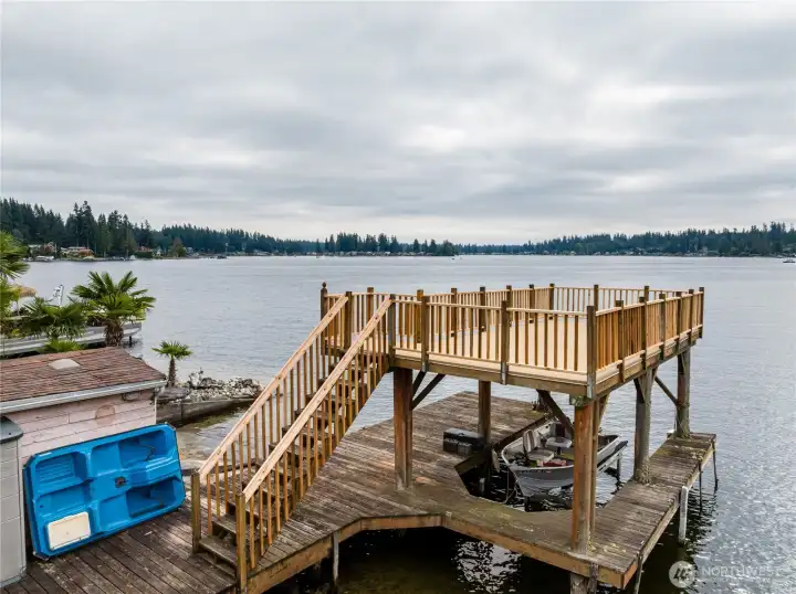 Private dock, boat lift and upper party deck that just got refurbished with new wood.