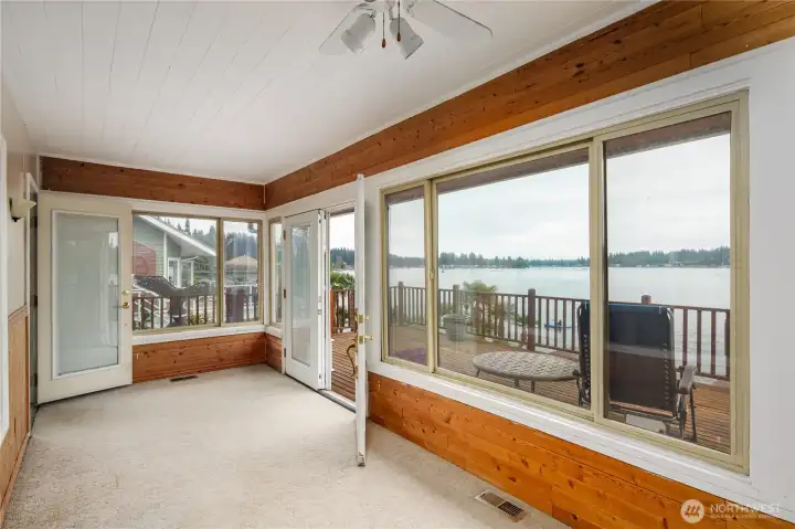 Great sunroom for sipping coffee in the morning and gazing at the lake.