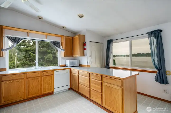 Light & bright kitchen has views of the lake.