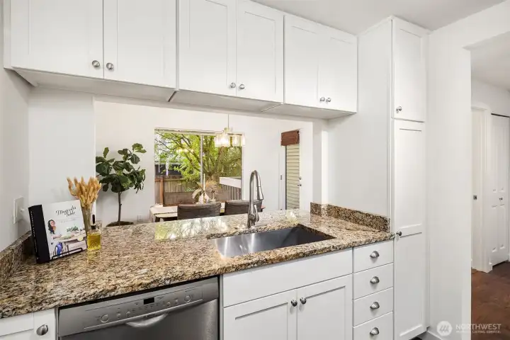 Kitchen opens to dining space.