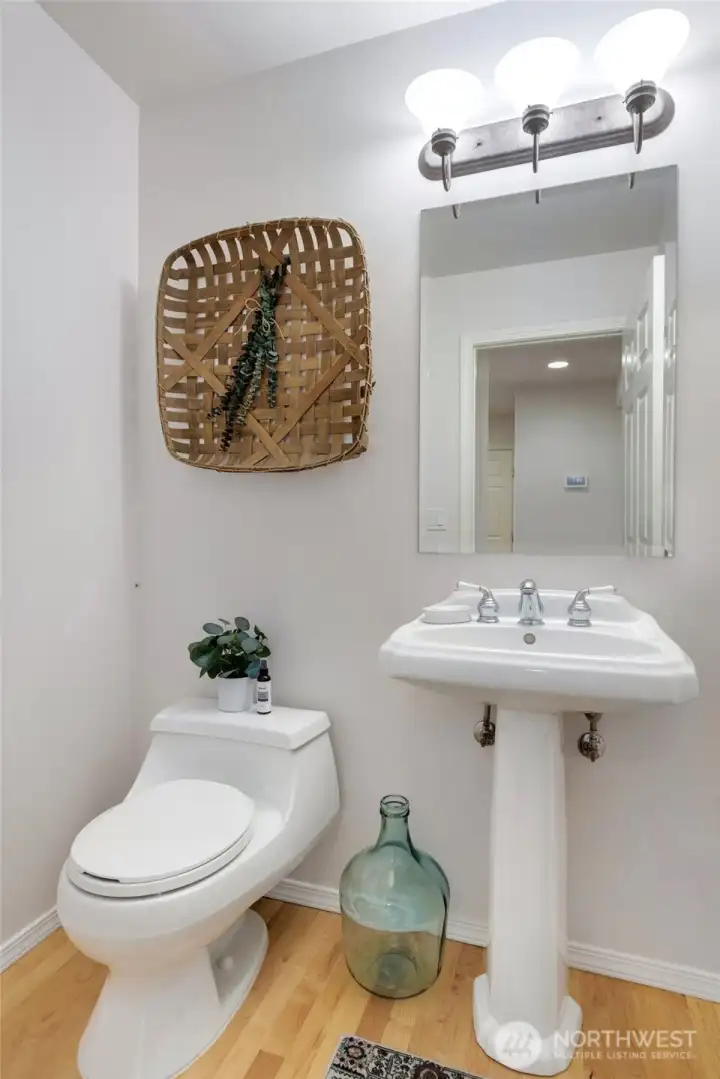 Powder Room as you walk to the Kitchen from the Front Door Entry