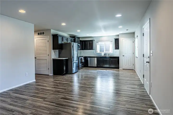 Another view into the dining/kitchen area