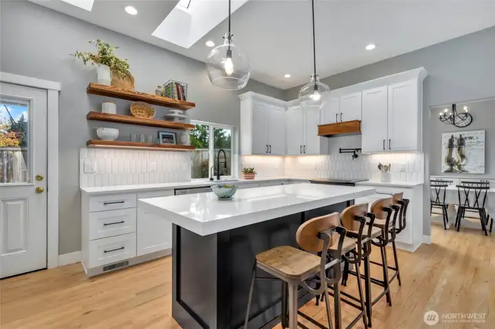 Beautifully Updated Kitchen w/ Quartz Countertops - Exterior Door Leads to Large Deck!