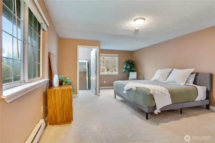 Big, bright windows flood the space with natural light—your personal retreat.