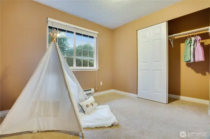 A generous closet provides plenty of room to keep everything organized and within easy reach.