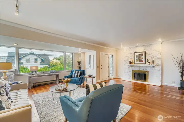 Hardwoods form a stunning backdrop for this spacious living space.