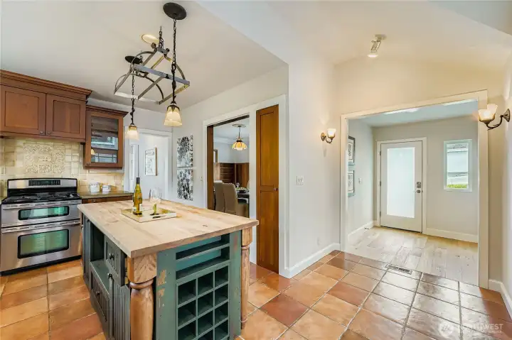 The side door across from the kitchen makes the connection between the house and the townhouse next door.
