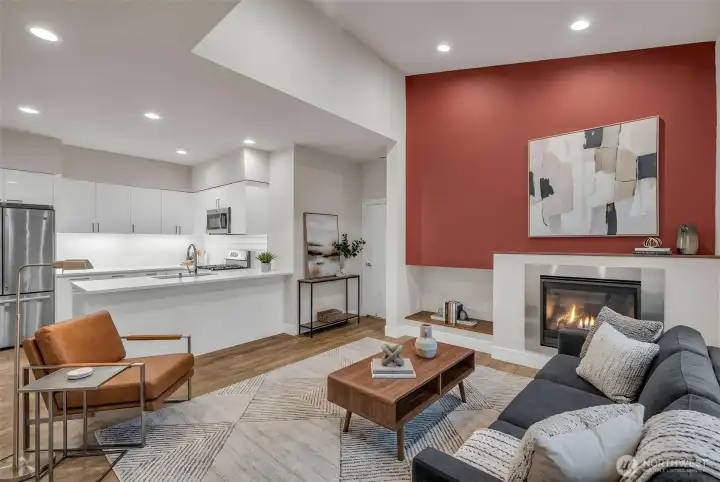 (Virtually Staged) Living room with high ceilings and cozy gas fireplace.