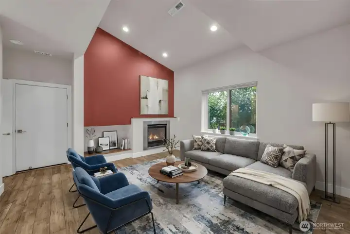 (Virtually Staged) Living room with high ceilings and cozy gas fireplace.
