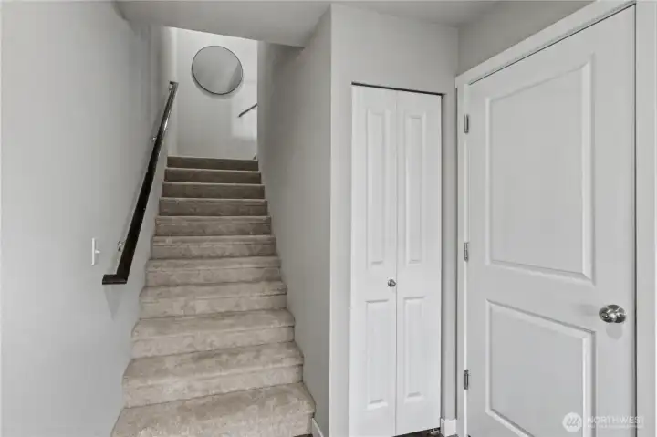 Entrance. Closet & garage to right