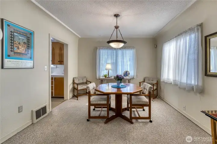 Dining room is conveniently located off the kitchen and is plenty large for family gatherings.