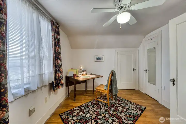 Bedroom currently used as an office with walk in closet and additional storge in the eve closet as well.