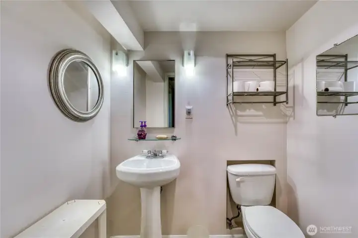 Newer half bathroom addition in the basement.