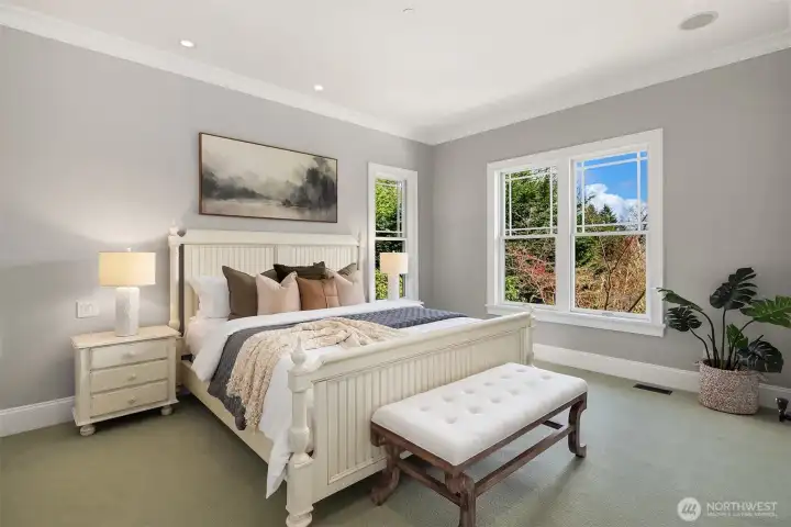 Main floor guest suite/primary suite.  Great for multi-generations.